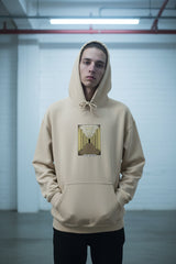 Beige hoodie with a colorful graphic on the chest against a white background