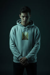 Gray hoodie with a graphic of a person at a desk on a white background