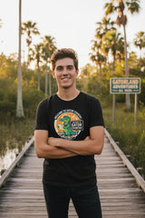 Black t-shirt with a gator graphic and text on a white background