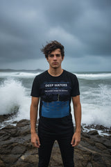 Black t-shirt with 'Deep Waters' graphic and text on a white background